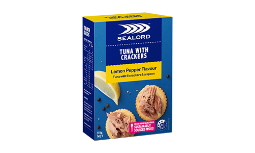 Sealord Tuna with Crackers – Lemon Pepper Flavour in boxed packaging, showing tuna on round crackers with lemon wedge and black pepper garnish.
