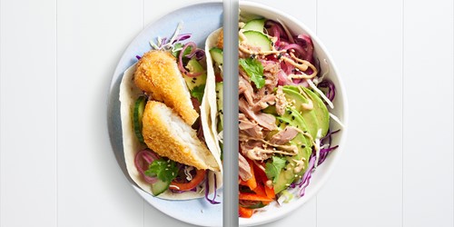Split plate featuring crispy fish tacos with slaw on one side, and a vibrant tuna salad with avocado, red cabbage, and sesame drizzle on the other.