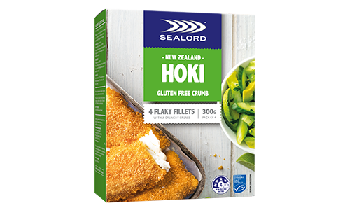 Sealord Gluten Free Crumb Hoki Fillets – boxed packaging with 4 golden flaky hoki fillets and a side of fresh zucchini salad.