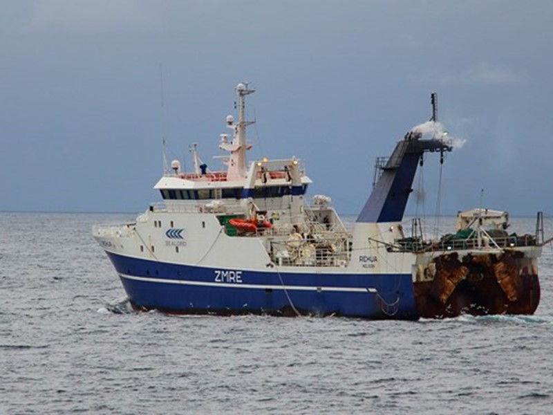 Sealord fishing vessel sailing in New Zealand waters, surrounded by the open ocean.