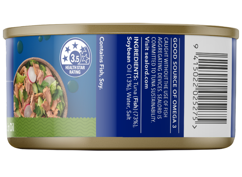 Side view of a Sealord Chunky Style Tuna in Oil can showing ingredients list, barcode, health star rating, and tuna salad image on the label