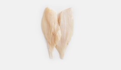 Two raw Oreo Dory fillets, skinless and boneless, with a delicate white flesh and fine texture.
