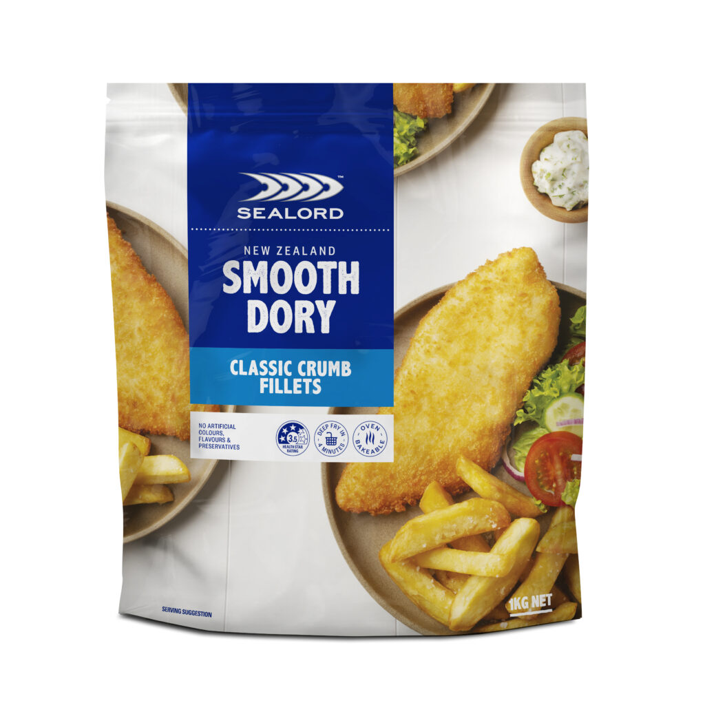 Sealord New Zealand Smooth Dory Classic Crumb Fillets 1kg pack, featuring an image of golden crumbed fish fillets served with chips, salad, and tartar sauce. Packaging highlights oven-ready convenience and no artificial preservatives.